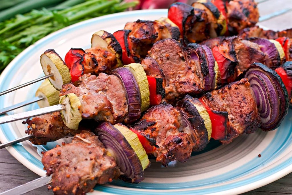 bison kabobs with onions and yellow squash